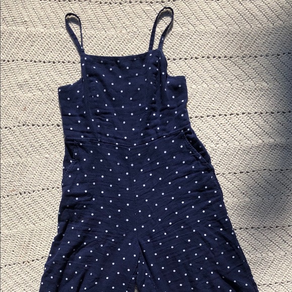 navy blue and white polka dot jumpsuit